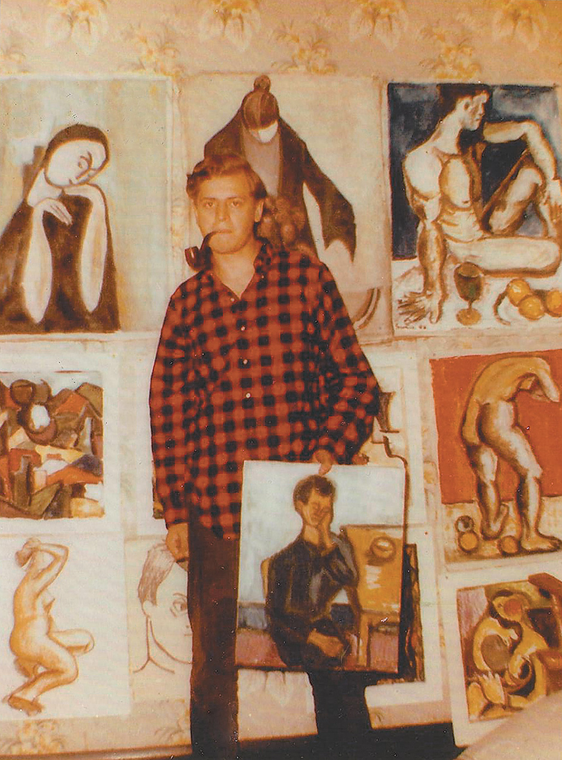 Charles Simic, age seventeen, with some of his paintings, Oak Park, Illinois, 1955