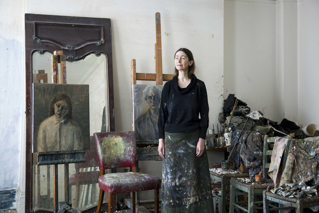 Celia Paul in her flat and studio in Bloomsbury, with the 2014 portraits Steve (left) and Alice